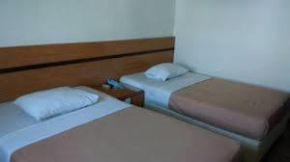 Отель Paradise Hotel  Танджунгпинанг